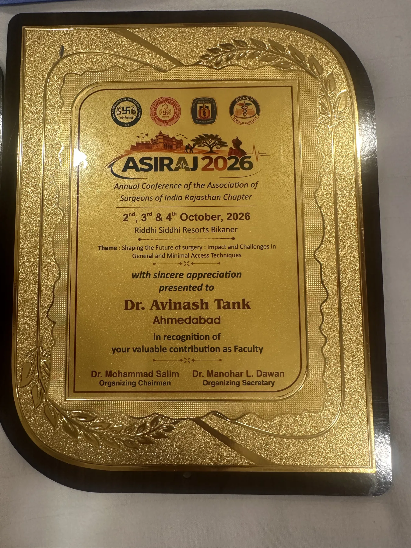 ASIRAJ 2026 plaque presented to Dr. Avinash Tank, Ahmedabad, in recognition of his contribution as Faculty