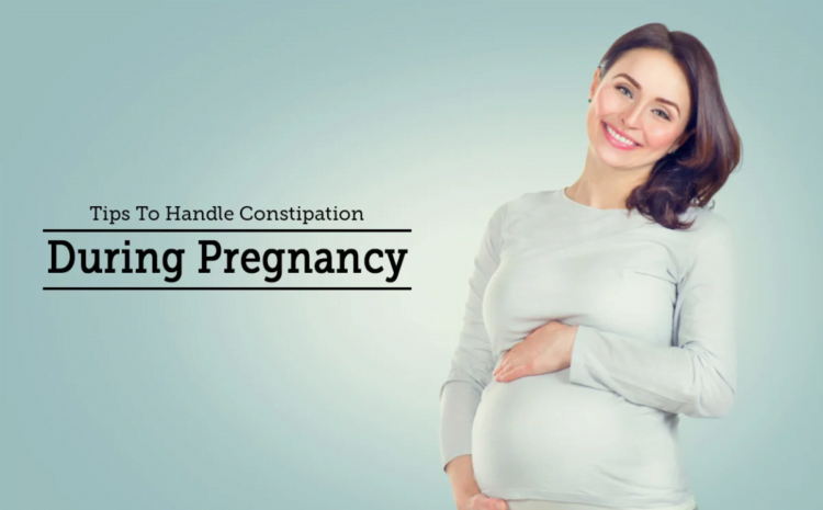 Pregnant woman holding her tummy